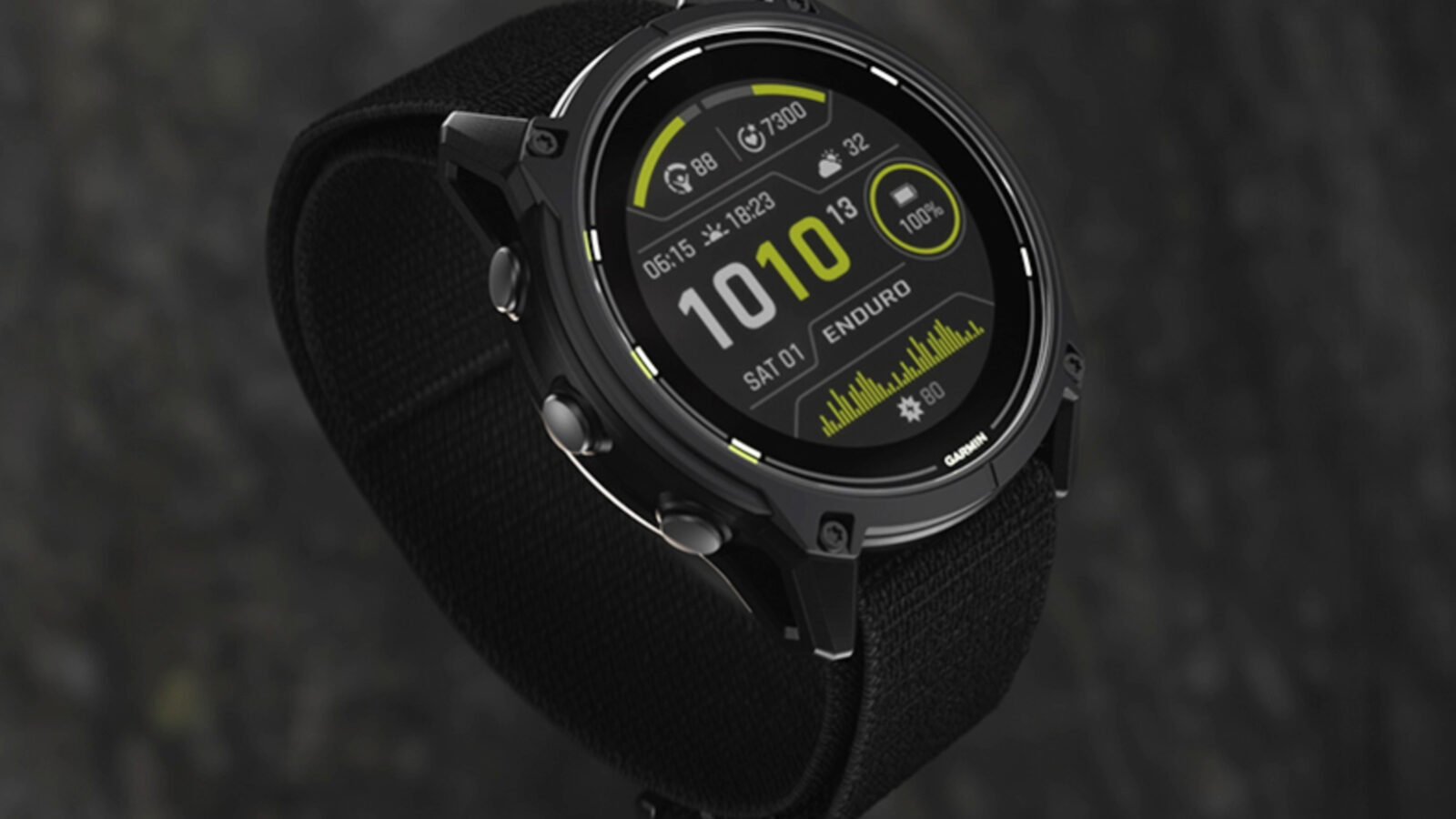 Garmin Enduro 3 with a black nylon strap and green-accented watch face